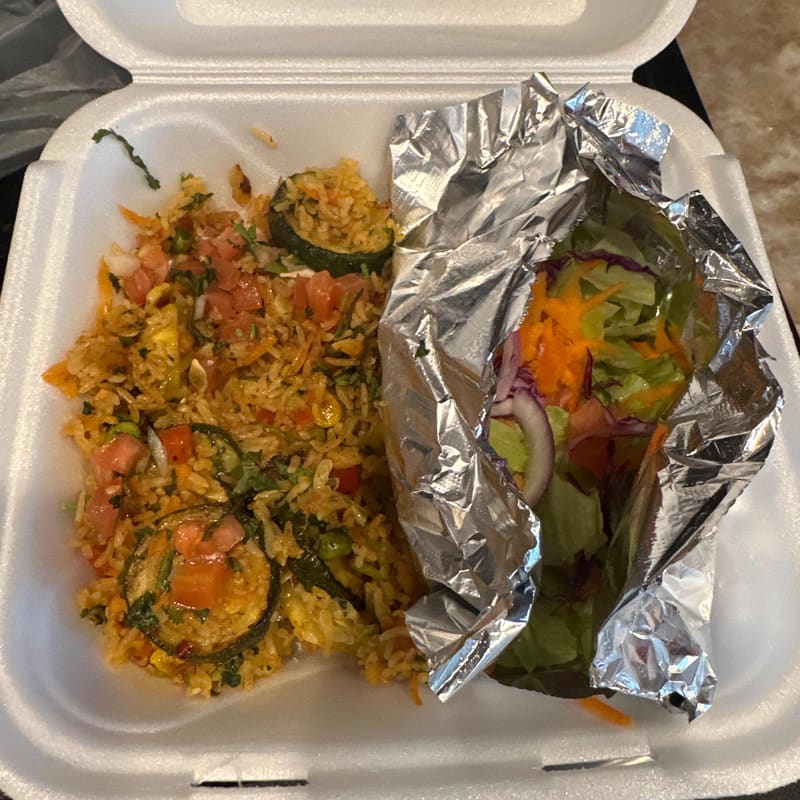 Lunch special plate with yellow rice and vegetables